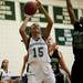 Green Hills junior Sabrina Thompson shoots under the rim on Monday, Feb. 11. Daniel Brenner I AnnArbor.com